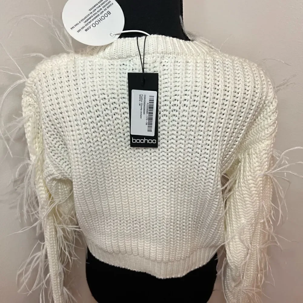 White Sweater with Feather detailing. NWT. Size M
